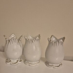 Vintage white porcelain mini vase with gold tone trim, possibly in a tulip shape